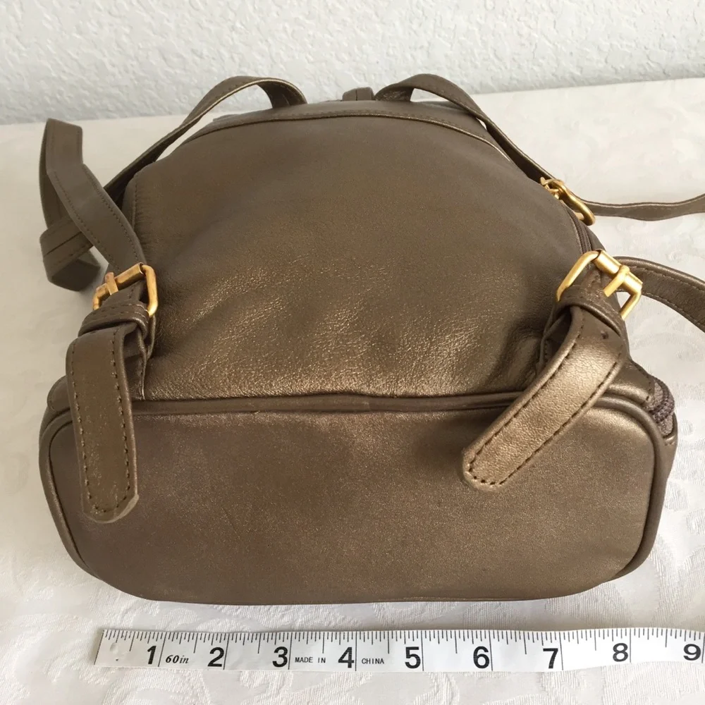 Gold bronze leather backpack